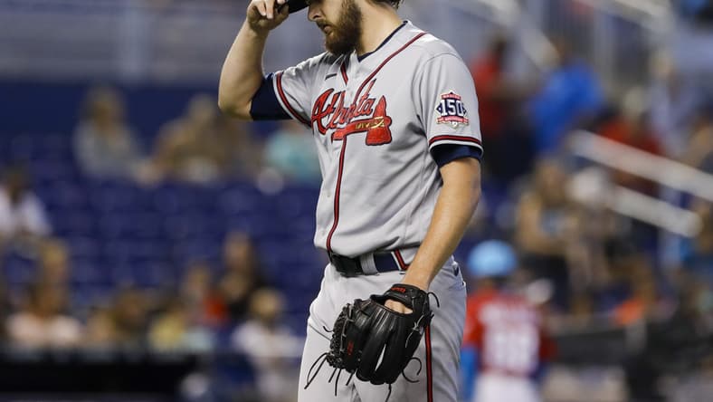 Jul 11, 2021; Miami, Florida, USA; Atlanta Braves starting pitcher Ian Anderson (36) reacts after the first inning against the Miami Marlins at loanDepot Park. Mandatory Credit: Sam Navarro-USA TODAY Sports