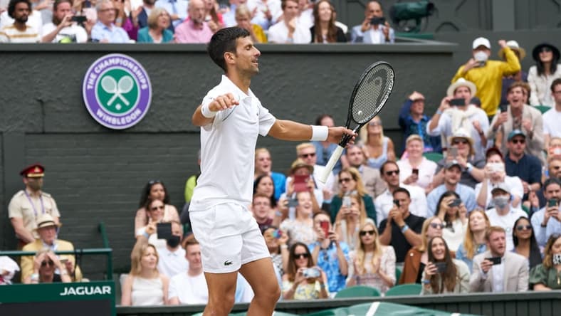 Jul 11, 2021; London, United Kingdom; Novak Djokovic (SRB) celebrates winning the mens final against Matteo Berrettini (ITA) on Centre Court at All England Lawn Tennis and Croquet Club. Mandatory Credit: Peter van den Berg-USA TODAY Sports