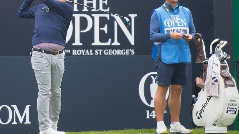 Jul 12, 2021; Sandwich, England, GBR; Robert MacIntyre of Scotland tees off during a practice round for the Open Championship golf tournament at Royal St. George's Golf Course. Mandatory Credit: Sandra Mailer-USA TODAY Sports
