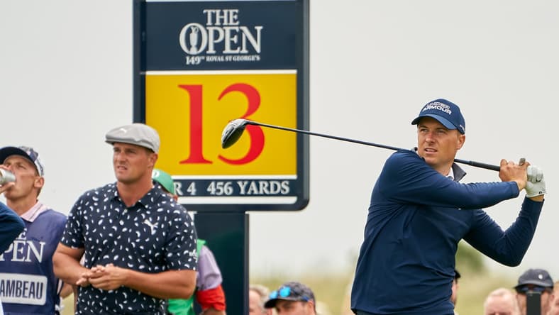 Jul 15, 2021; Sandwich, England, GBR; Jordan Spieth plays his shot at the thirteenth tee during the first round of the Open Championship golf tournament. Mandatory Credit: Peter van den Berg-USA TODAY Sports