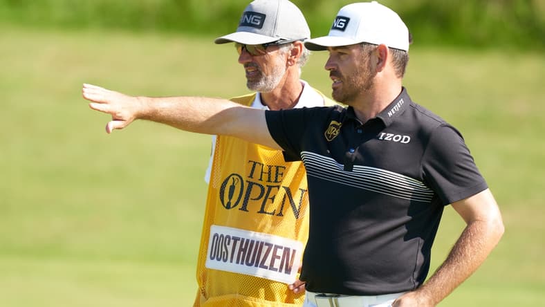 Jul 16, 2021; Sandwich, England, GB; Louis Oosthuizen  looks over his putt on the sixth green during the second  round of the Open Championship golf tournament. Mandatory Credit: Peter van den Berg-USA TODAY Sports