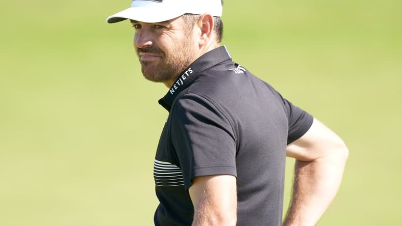 Jul 16, 2021; Sandwich, England, GB; Louis Oosthuizen  looks over his putt on the sixth green during the second  round of the Open Championship golf tournament. Mandatory Credit: Peter van den Berg-USA TODAY Sports