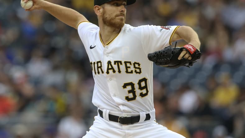 Jul 16, 2021; Pittsburgh, Pennsylvania, USA; Pittsburgh Pirates starting pitcher Chad Kuhl (39) delivers a pitch against the New York Mets during the first inning at PNC Park. Mandatory Credit: Charles LeClaire-USA TODAY Sports