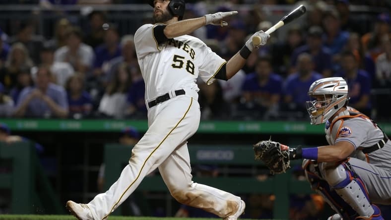 Jul 17, 2021; Pittsburgh, Pennsylvania, USA;  Pittsburgh Pirates catcher Jacob Stallings (58) hits a game winning grand slam home run to defeat the New York Mets during the ninth inning at PNC Park. Pittsburgh won 9-7. Mandatory Credit: Charles LeClaire-USA TODAY Sports