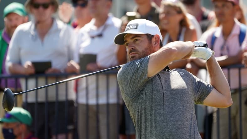 Jul 18, 2021; Sandwich, England, GBR; Louis Oosthuizen  plays his shot from the second tee during the final round of the Open Championship golf tournament. Mandatory Credit: Peter van den Berg-USA TODAY Sports