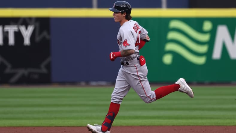 Jul 19, 2021; Buffalo, New York, USA;  Boston Red Sox center fielder Jarren Duran (40) hits a two run home run during the first inning at bat at Sahlen Field. Mandatory Credit: Timothy T. Ludwig-USA TODAY Sports