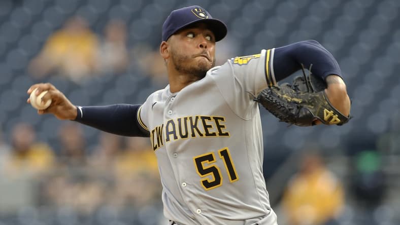 Jul 29, 2021; Pittsburgh, Pennsylvania, USA;  Milwaukee Brewers starting pitcher Freddy Peralta (51) delivers a pitch against the Pittsburgh Pirates during the first inning at PNC Park. Mandatory Credit: Charles LeClaire-USA TODAY Sports