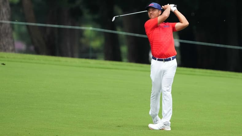 Jul 30, 2021; Tokyo, Japan; Xander Schauffele (USA) hits on the third hole during round two of the men's individual stroke play of the Tokyo 2020 Olympic Summer Games at Kasumigaseki Country Club. Mandatory Credit: Kyle Terada-USA TODAY Sports