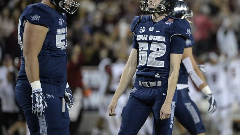 Dec 29, 2017; Tucson, AZ, USA; Utah State Aggies place kicker Dominik Eberle (62) reacts after missing a field goal during overtime in the 2017 Arizona Bowl against the New Mexico State Aggies at Arizona Stadium. Mandatory Credit: Casey Sapio-USA TODAY Sports
