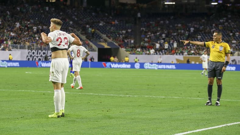 Jun 29, 2019; Houston, TX, USA; Canada defender Marcus Godinho (23) reacts after being called for a foul against Haiti which resulted in a penalty kick during the second half during quarterfinal play in the CONCACAF Gold Cup soccer tournament at NRG Stadium. Mandatory Credit: John Glaser-USA TODAY Sports