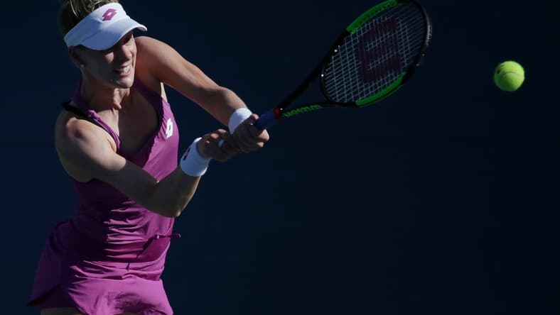 Aug 29, 2019; Flushing, NY, USA; Alison Riske of the United States returns a shot against Jelena Ostapenko of Latvia in a second round match on day four of the 2019 U.S. Open tennis tournament at USTA Billie Jean King National Tennis Center. Mandatory Credit: Jerry Lai-USA TODAY Sports