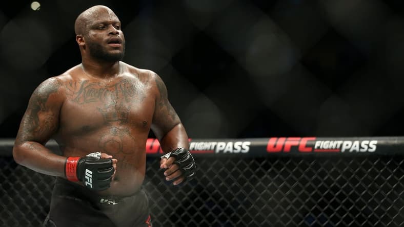 Feb 8, 2020; Houston, Texas, USA; Derrick Lewis (red gloves) fights Ilir Latifi (blue gloves) during UFC 247 at Toyota Center. Mandatory Credit: Thomas Shea-USA TODAY Sports