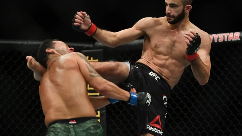 May 16, 2020; Jacksonville, Florida, USA;   Giga Chikadze (red gloves) fights Irwin Rivera (blue gloves) during UFC on ESPN at VyStar Veterans Memorial Arena. Mandatory Credit: Jasen Vinlove-USA TODAY Sports