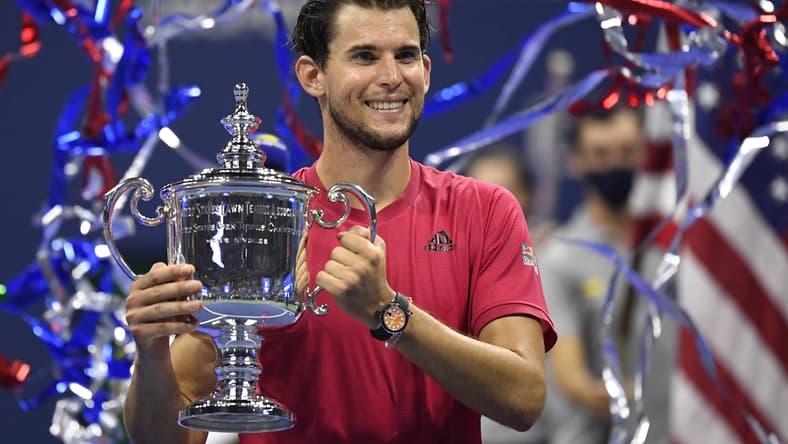 Sep 13 2020; Flushing Meadows, New York, USA; Dominic Thiem of Austria celebrates with the championship trophy after his match against Alexander Zverev of Germany (not pictured) in the men's singles final match on day fourteen of the 2020 U.S. Open tennis tournament at USTA Billie Jean King National Tennis Center. Mandatory Credit: Danielle Parhizkaran-USA TODAY Sports