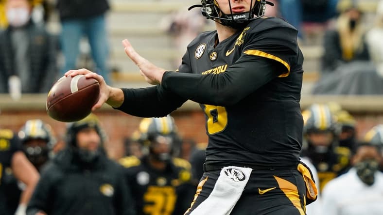 Dec 12, 2020; Columbia, Missouri, USA; Missouri Tigers quarterback Connor Bazelak (8) throws a pass against the Georgia Bulldogs during the first half at Faurot Field at Memorial Stadium. Mandatory Credit: Jay Biggerstaff-USA TODAY Sports