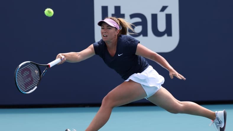 Mar 25, 2021; Miami, Florida, USA; Kristina Kucova of Slovakia reaches for a forehand against Ashleigh Barty of Australia (not pictured) in the second round of the Miami Open at Hard Rock Stadium. Mandatory Credit: Geoff Burke-USA TODAY Sports