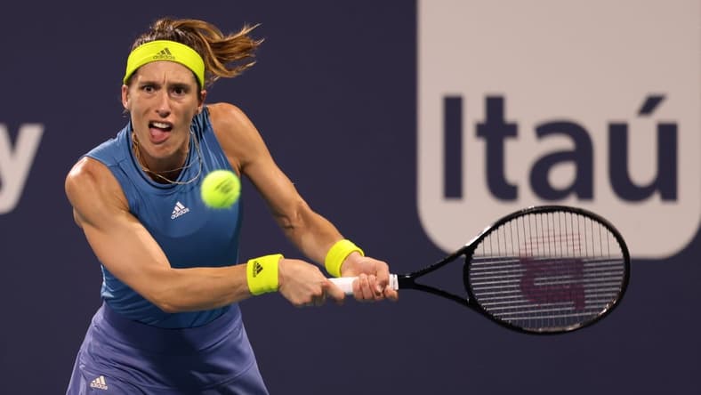 Mar 26, 2021; Miami, Florida, USA; Andrea Petkovic of Germany hits a backhand against Sofia Kenin of the United States (not pictured) in the second round in the Miami Open at Hard Rock Stadium. Mandatory Credit: Geoff Burke-USA TODAY Sports