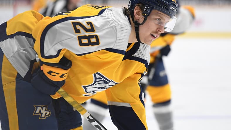 Apr 3, 2021; Nashville, Tennessee, USA; Nashville Predators right wing Eeli Tolvanen (28) lines up for a face off during the first period against the Chicago Blackhawks at Bridgestone Arena. Mandatory Credit: Christopher Hanewinckel-USA TODAY Sports