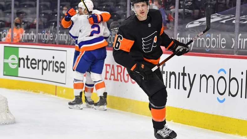 Apr 18, 2021; Philadelphia, Pennsylvania, USA; Philadelphia Flyers defenseman Travis Sanheim (6) skates away as New York Islanders defenseman Nick Leddy (2) celebrates his game winning goal in overtime at Wells Fargo Center. Mandatory Credit: Eric Hartline-USA TODAY Sports