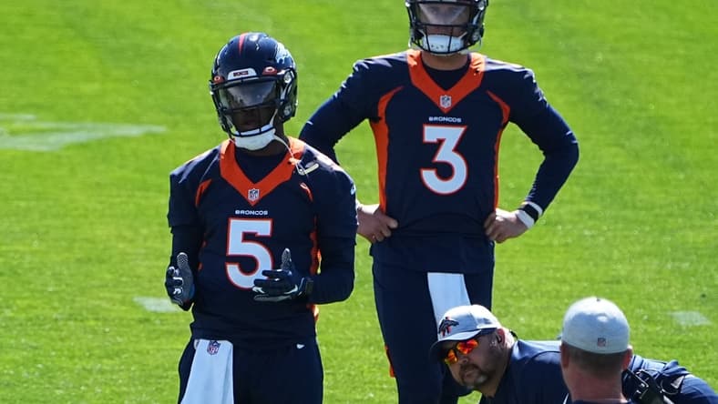 Jun 1, 2021; Englewood, Colorado, USA; Denver Broncos quarterback Teddy Bridgewater (5) and quarterback Drew Lock (3) during organized team activities at the UCHealth Training Center. Mandatory Credit: Ron Chenoy-USA TODAY Sports