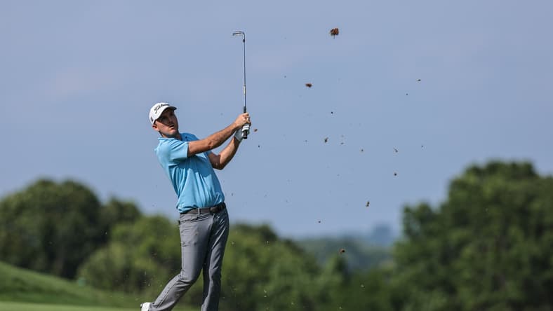 Jun 27, 2021; Cromwell, Connecticut, USA; Russell Henley plays his shot from the 14th fairway during the final round of the Travelers Championship golf tournament. Mandatory Credit: Vincent Carchietta-USA TODAY Sports