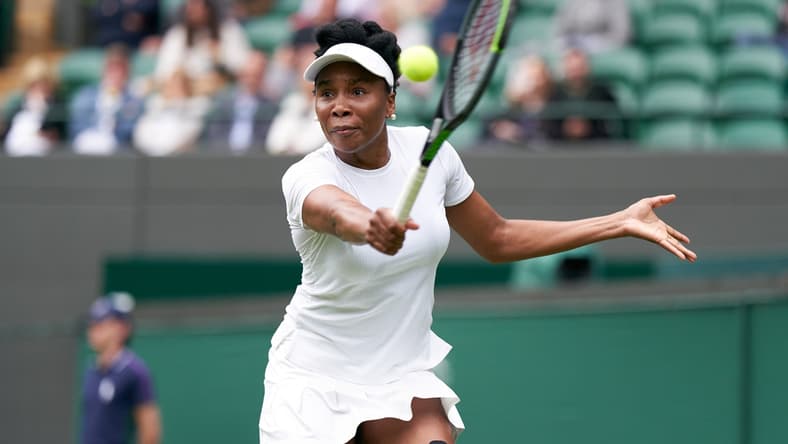 Jun 30, 2021; London, United Kingdom; Venus Williams (USA) seen playing Ons Jabeur (TUN) in second round  singles on No. 1 court at All England Lawn Tennis and Croquet Club. Mandatory Credit: Peter van den Berg-USA TODAY Sports