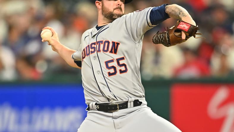 Jul 3, 2021; Cleveland, Ohio, USA; Houston Astros relief pitcher Ryan Pressly (55) throws a pitch against the Cleveland Indians during the ninth inning at Progressive Field. Mandatory Credit: Ken Blaze-USA TODAY Sports