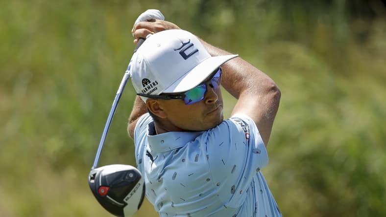 Jul 24, 2021; Blaine, Minnesota, USA; Rickie Fowler drives from the 12th tee during the third round of the 3M Open golf tournament. Mandatory Credit: Bruce Kluckhohn-USA TODAY Sports