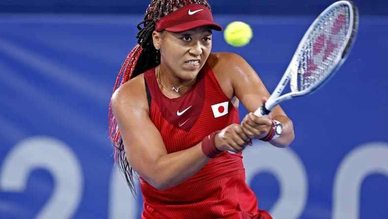 Jul 27, 2021; Tokyo, Japan; Naomi Osaka (JPN) plays Marketa Vondrousova (CZE) in the women's tennis third round singles during the Tokyo 2020 Olympic Summer Games at Ariake Tennis Park. Mandatory Credit: Yukihito Taguchi-USA TODAY Sports