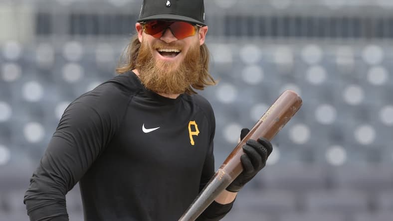 Jul 27, 2021; Pittsburgh, Pennsylvania, USA;  Pittsburgh Pirates left fielder Ben Gamel (18) reacts at the batting cage before a game against the Milwaukee Brewers at PNC Park. Mandatory Credit: Charles LeClaire-USA TODAY Sports