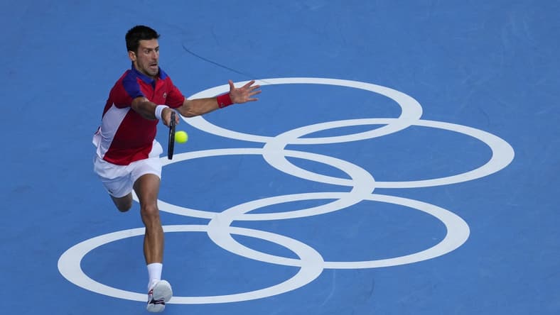 Jul 31, 2021; Tokyo, Japan; Novak Djokovic (SRB) plays Pablo Carreno Busta (ESP) in the men's tennis bronze medal match during the Tokyo 2020 Olympic Summer Games at Ariake Tennis Park. Mandatory Credit: Robert Deutsch-USA TODAY Sports