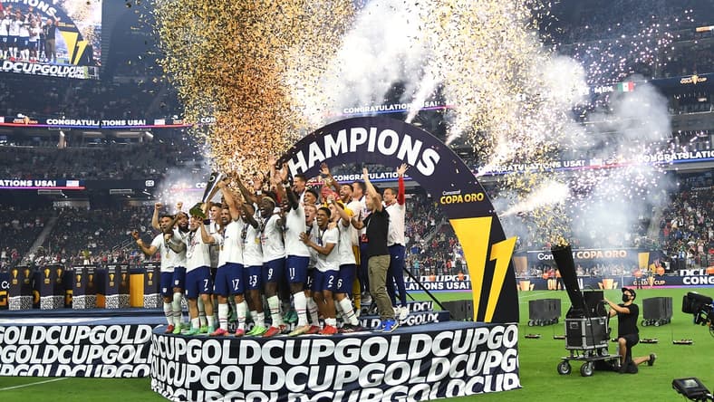 Aug 1, 2021; Las Vegas, Nevada, USA; USA players celebrate after defeating Mexico 1-0 in extra time to win the CONCACAF Gold Cup final soccer match at Allegiant Stadium. Mandatory Credit: Stephen R. Sylvanie-USA TODAY Sports