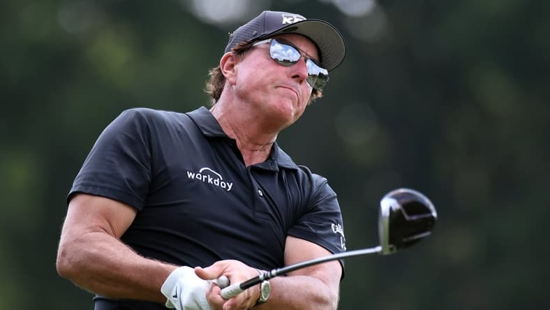 Aug 7, 2021; Memphis, Tennessee, USA; Phil Mickelson hits his tee shot on the second hole during the third round of the WGC FedEx St. Jude Invitational golf tournament at TPC Southwind. Mandatory Credit: Christopher Hanewinckel-USA TODAY Sports