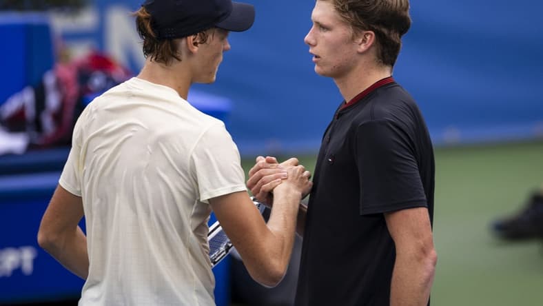 Aug 7, 2021; Washington, DC, USA; (L-R) Jannik Sinner of Italy shakes hands with Jenson Brooksby of the United States after winning the match during the Citi Open at Rock Creek Park Tennis Center. Mandatory Credit: Scott Taetsch-USA TODAY Sports