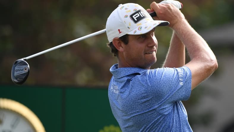 Aug 7, 2021; Memphis, Tennessee, USA; Harris English watches his tee shot on the 18th hole during the third round of the WGC FedEx St. Jude Invitational golf tournament at TPC Southwind. Mandatory Credit: Christopher Hanewinckel-USA TODAY Sports