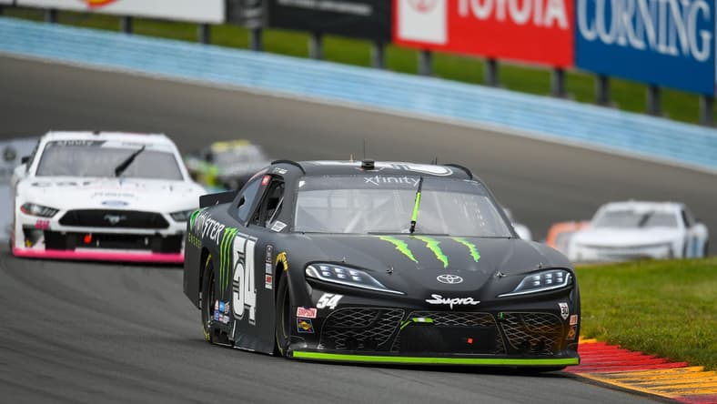Aug 7, 2021; Watkins Glen, NY, USA; NASCAR Xfinity Series driver Ty Gibbs (54) leads a group of cars during the Skrewball Peanut Butter Whiskey 200 at Watkins Glen International. Mandatory Credit: Rich Barnes-USA TODAY Sports
