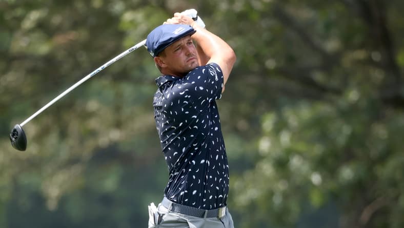 Bryson DeChambeau watches his tee shot of on the par 4, Hole No. 7 during the final round of the World Golf Championships FedEx-St. Jude Invitational on Sunday, August 8, 2021, at TPC Southwind in Memphis, Tenn.

Done Jrca8411