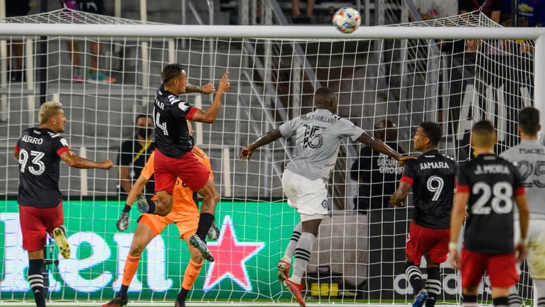 Aug 8, 2021; Washington, DC, Washington, DC, USA;  D.C. United midfielder Andy Najar (14) heads the ball into the net for a goal against the CF Montr al during the first half at Audi Field. Mandatory Credit: Rafael Suanes-USA TODAY Sports