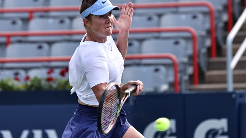Aug 11, 2021; Montreal, Quebec, Canada; Elina Svitolina from Ukrania hits a shot against Johanna Konta from Great Britain (not pictured) during the second round play at Stade IGA. Mandatory Credit: Jean-Yves Ahern-USA TODAY Sports