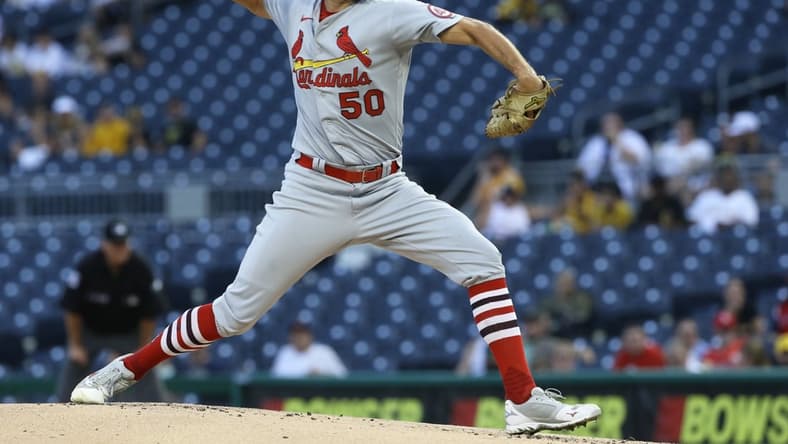 Aug 11, 2021; Pittsburgh, Pennsylvania, USA;  St. Louis Cardinals starting pitcher Adam Wainwright (50) delivers a pitch against the Pittsburgh Pirates during the first inning at PNC Park. Mandatory Credit: Charles LeClaire-USA TODAY Sports