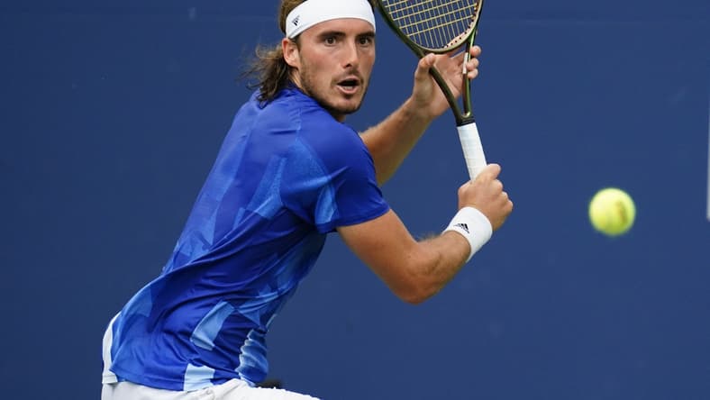 Aug 13, 2021; Toronto, Ontario, Canada; Stefanos Tsitsipas of Greece returns a ball to Casper Ruud of Norway  (not pictured) at Aviva Centre. Mandatory Credit: John E. Sokolowski-USA TODAY Sports