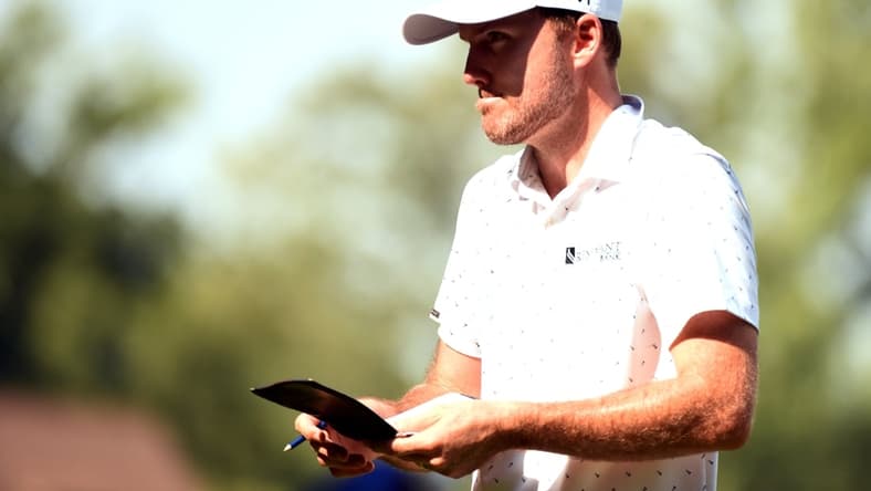 Aug 13, 2021; Greensboro, North Carolina, USA; Russell Henley walks to the second tee during the second round of the Wyndham Championship golf tournament. Mandatory Credit: Rob Kinnan-USA TODAY Sports