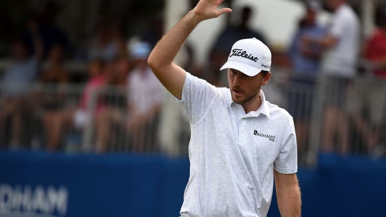 Aug 14, 2021; Greensboro, North Carolina, USA; Russell Henley reacts after making eagle on the 15th hole during the third round of the Wyndham Championship golf tournament. Mandatory Credit: Rob Kinnan-USA TODAY Sports