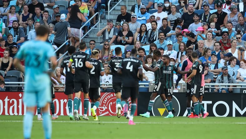 Aug 14, 2021; Saint Paul, MN, Saint Paul, MN, USA; Los Angeles Galaxy forward Kevin Cabral (9) celebrates with teammates after scoring a goal against Minnesota United in the first half at Allianz Field. Mandatory Credit: David Berding-USA TODAY Sports
