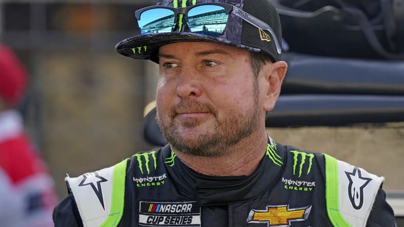 Aug 15, 2021; Speedway, Indiana, USA; NASCAR Cup Series driver Kurt Busch (1) looks on before the Verizon 200 at the Brickyard at Indianapolis Motor Speedway Road Course. Mandatory Credit: Mike Dinovo-USA TODAY Sports