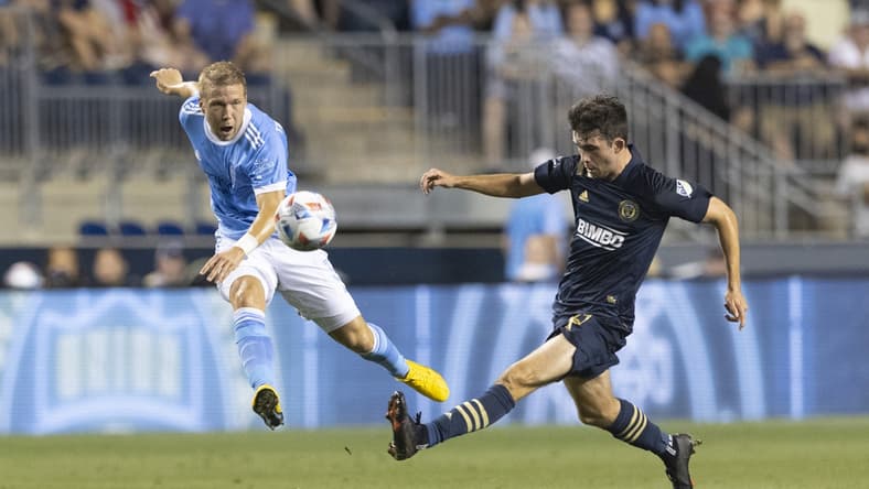 Aug 18, 2021; Chester, Pennsylvania, USA; New York City FC defender Anton Tinnerholm (3) passes the ball against Philadelphia Union midfielder Leon Flach (31) in the first half at Subaru Park. Mandatory Credit: Mitchell Leff-USA TODAY Sports
