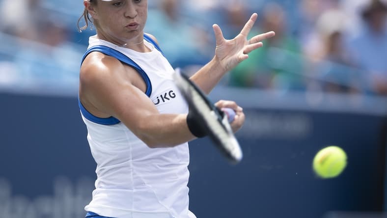 Aug 19, 2021; Mason, OH, USA; Ashleigh Barty (AUS) hits a forehand against Victoria Azarenka (BLR, not pictured) during the Western and Southern Open at Lindner Family Tennis Center. Mandatory Credit: Susan Mullane-USA TODAY Sports