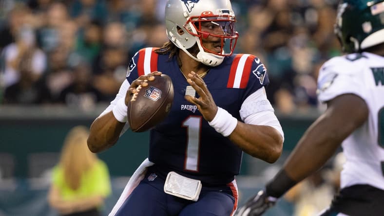 Aug 19, 2021; Philadelphia, Pennsylvania, USA; New England Patriots quarterback Cam Newton (1) drops back to pass against the Philadelphia Eagles during the first quarter at Lincoln Financial Field. Mandatory Credit: Bill Streicher-USA TODAY Sports
