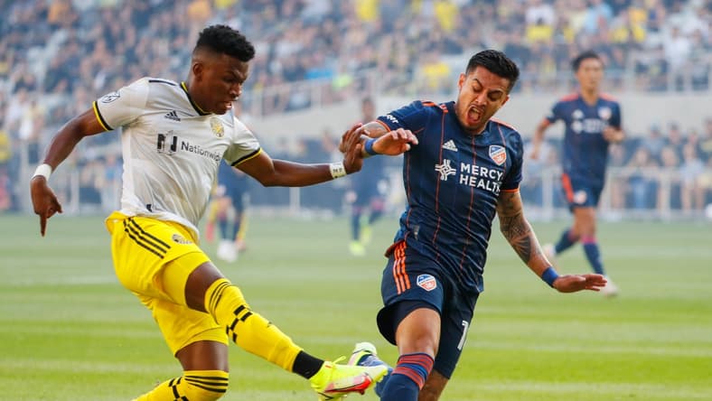 Columbus Crew midfielder Luis Diaz (12) kicks the ball past FC Cincinnati defender Ronald Matarrita (18) during the first half of a MLS match between the Columbus Crew and FC Cincinnati on Friday, Aug. 27, 2021 at Lower.com Field in Columbus, Ohio.
Mls Fc Cincinnati At Columbus Crew