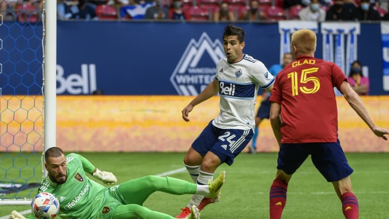 Aug 29, 2021; Vancouver, British Columbia, CAN; Real Salt Lake goalkeeper Andrew Putna (51) stops a shot on net by the Vancouver Whitecaps FC during the first half at BC Place. Mandatory Credit: Anne-Marie Sorvin-USA TODAY Sports